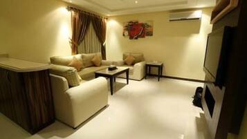Superior Apartment, 1 Bedroom, City View | Living room | 42-inch LED TV with cable channels, TV