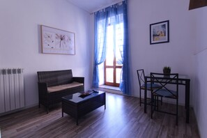 Suite Junior, 1 chambre, balcon | Salle de séjour