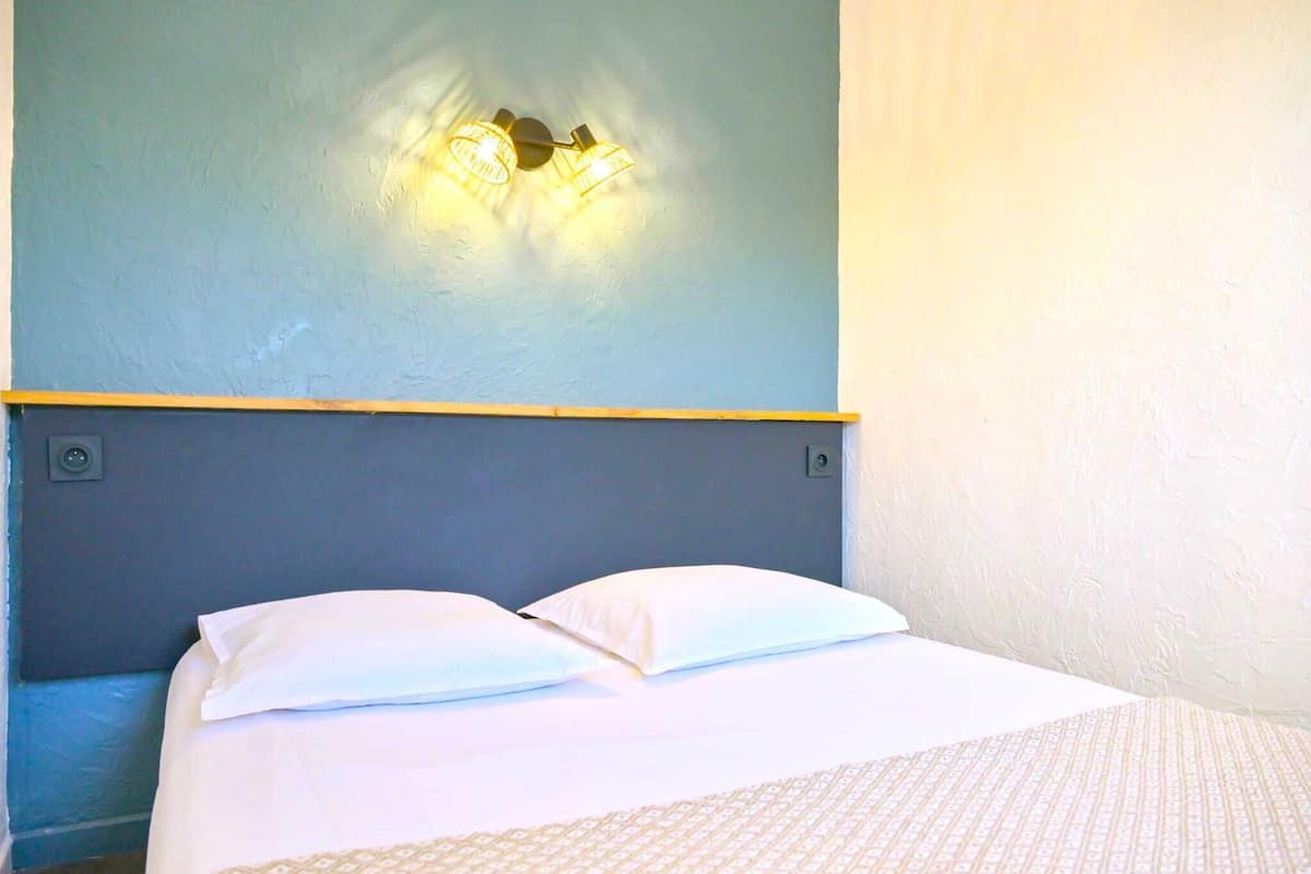 Standard Apartment, 1 Bedroom, Balcony, Garden View | 1 bedroom, in-room safe, individually decorated, desk