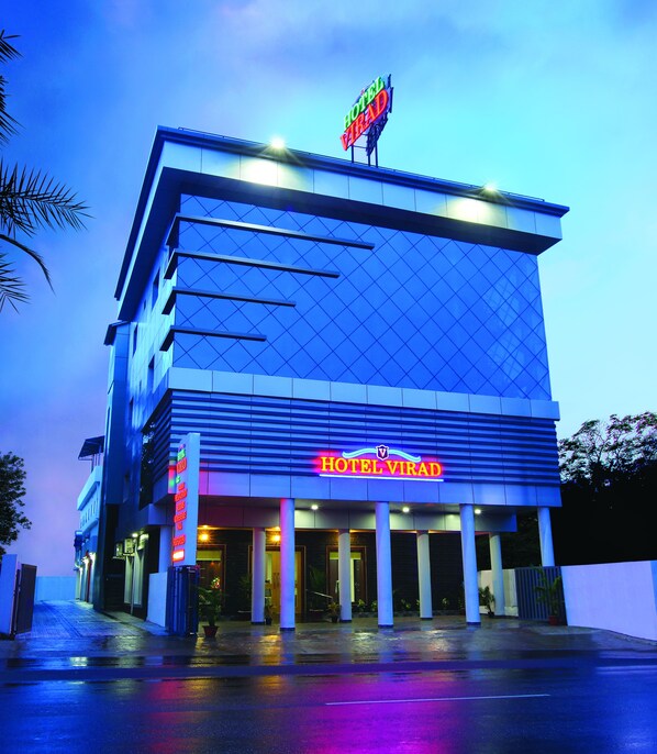 A modern hotel with a prominent sign reading "HOTEL VIRADA" and a large glass facade. - Hotel Virad (Tirur)