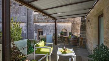 Suite, vista giardino | Terrazza/patio