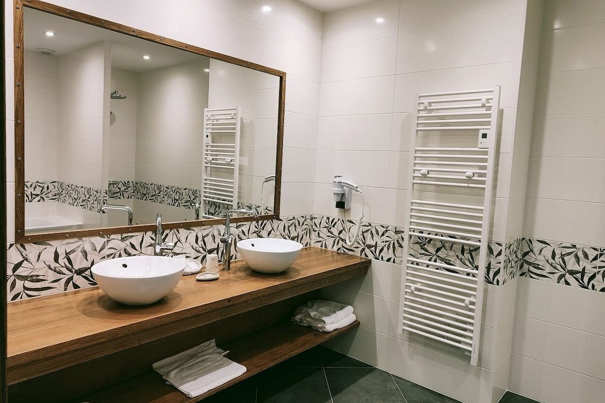 suite, 1 double bed with sofa bed, garden view | bathroom | shower, free toiletries, hair dryer, towels