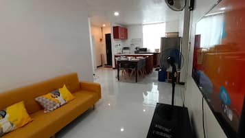 3 Bedrooms Condo(4th Floor, Stairs only) 403 | Living area | 32-inch flat-screen TV with digital channels, TV, DVD player