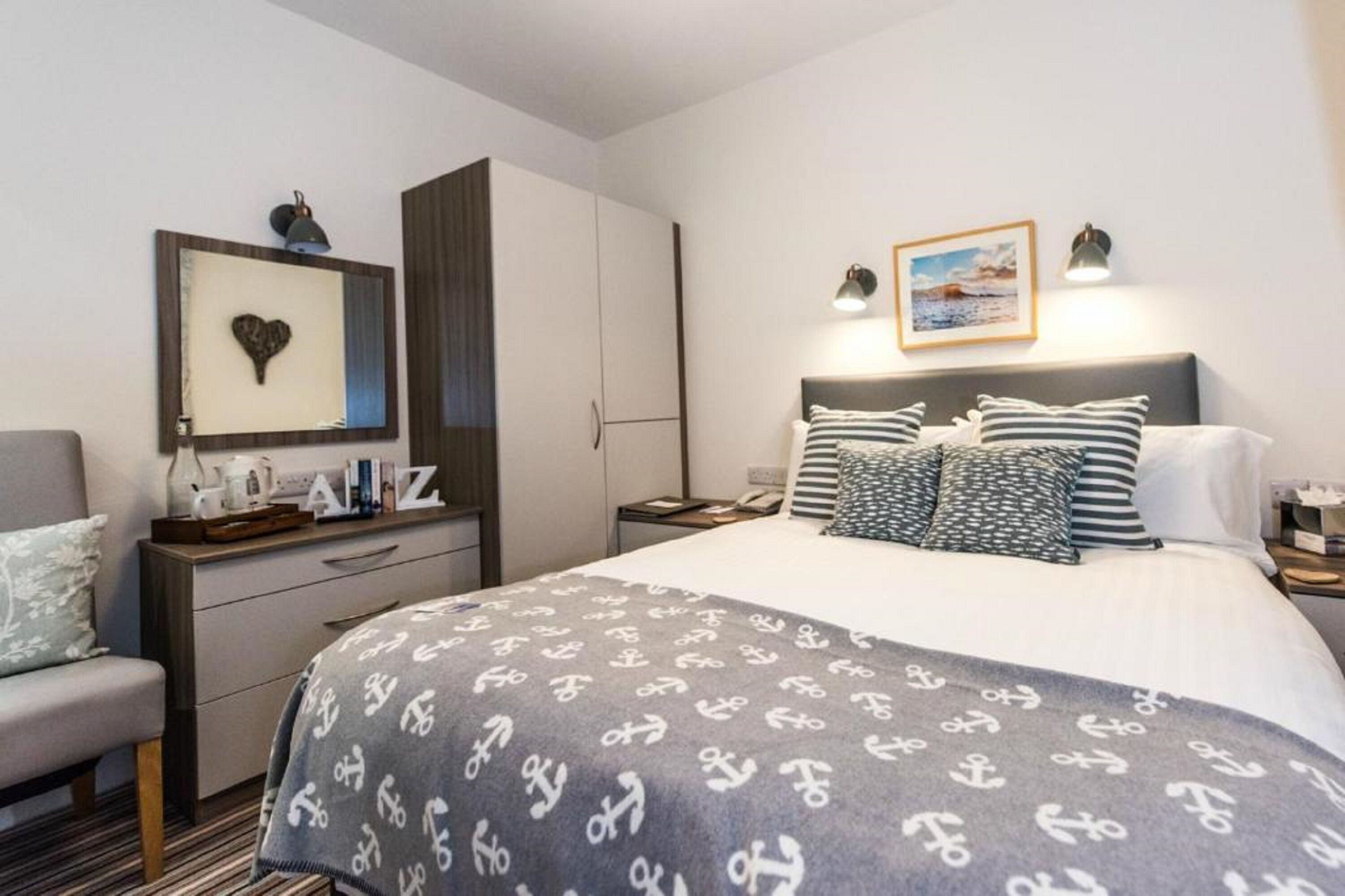 In-room safe, iron/ironing board, free wired Internet, bed sheets