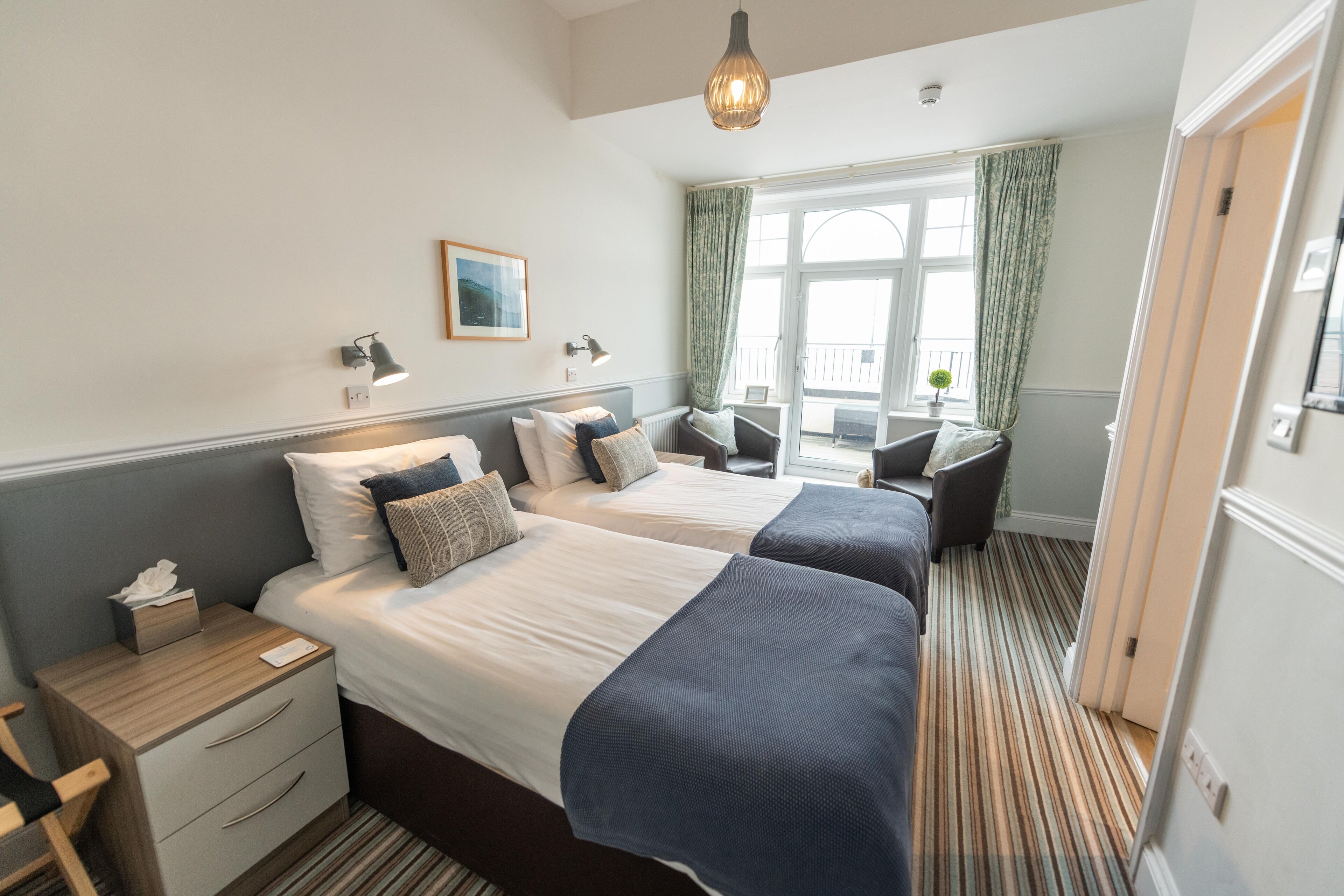 standard twin room, sea view | 1 bedroom, in-room safe, iron/ironing board, free wired internet