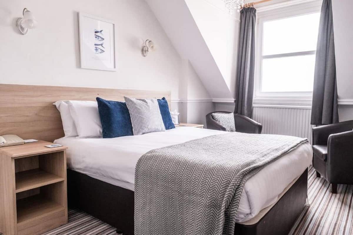 In-room safe, iron/ironing board, free wired internet, bed sheets