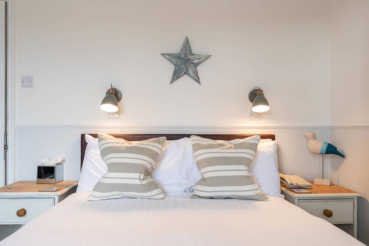 In-room safe, iron/ironing board, free wired internet, bed sheets