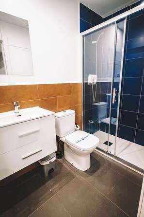 Shower, free toiletries, hair dryer, towels