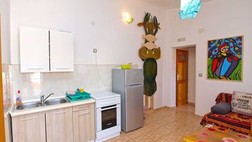 Apartment, 1 Bedroom (750/1755) | Living area | Flat-screen TV