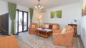 Apartment, 2 Bedrooms (1223/11184) | Living area | Flat-screen TV - Apartments Anka 1223 (Vodnjan)
