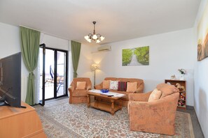 Apartment, 2 Bedrooms (1223/11184) | Living area | Flat-screen TV - Apartments Anka 1223 (Vodnjan)