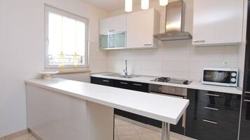 Appartamento, 2 camere da letto (1048/3908) | Cucina privata | Frigorifero, piano cottura, macchina per tè/caffè, bollitore elettrico