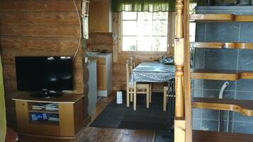 Chalet, Sauna, Lakeside | Living room | Flat-screen TV, fireplace