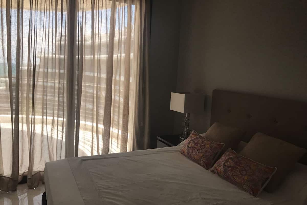 apartment, ocean view | 3 bedrooms, in-room safe, desk, blackout curtains