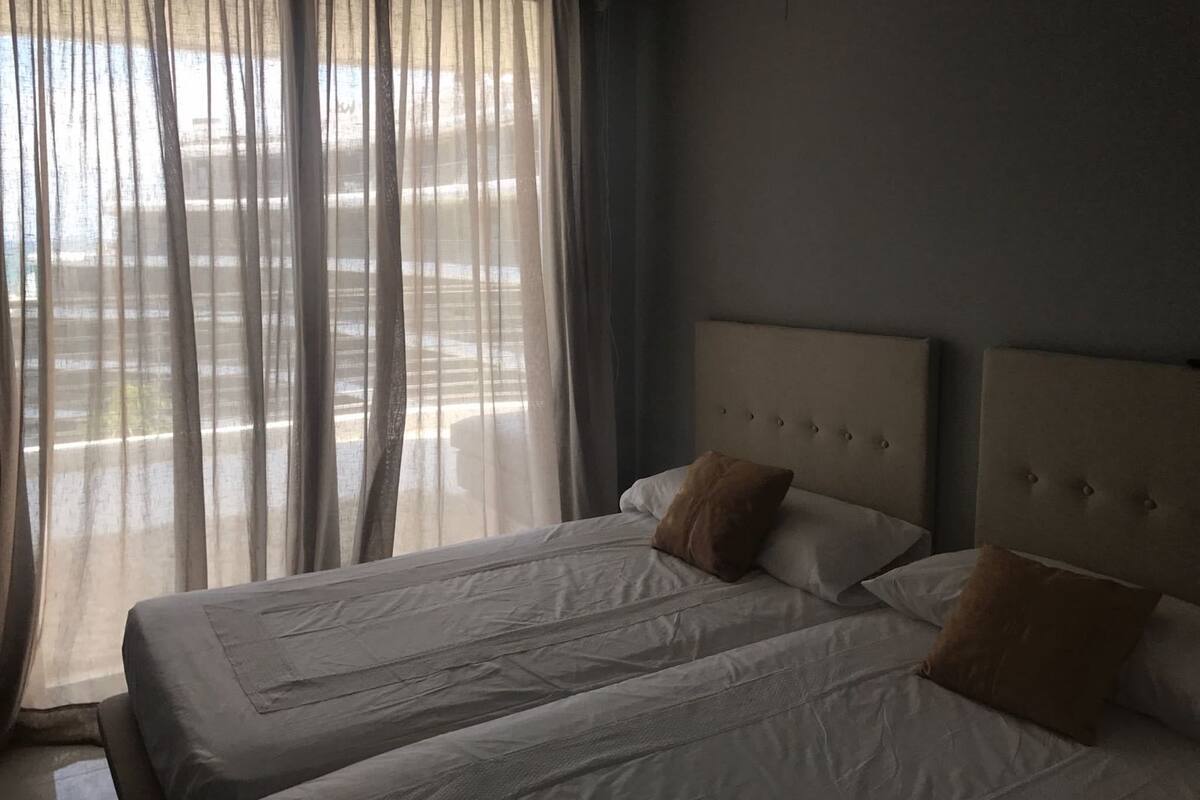 apartment, ocean view | 3 bedrooms, in-room safe, desk, blackout curtains