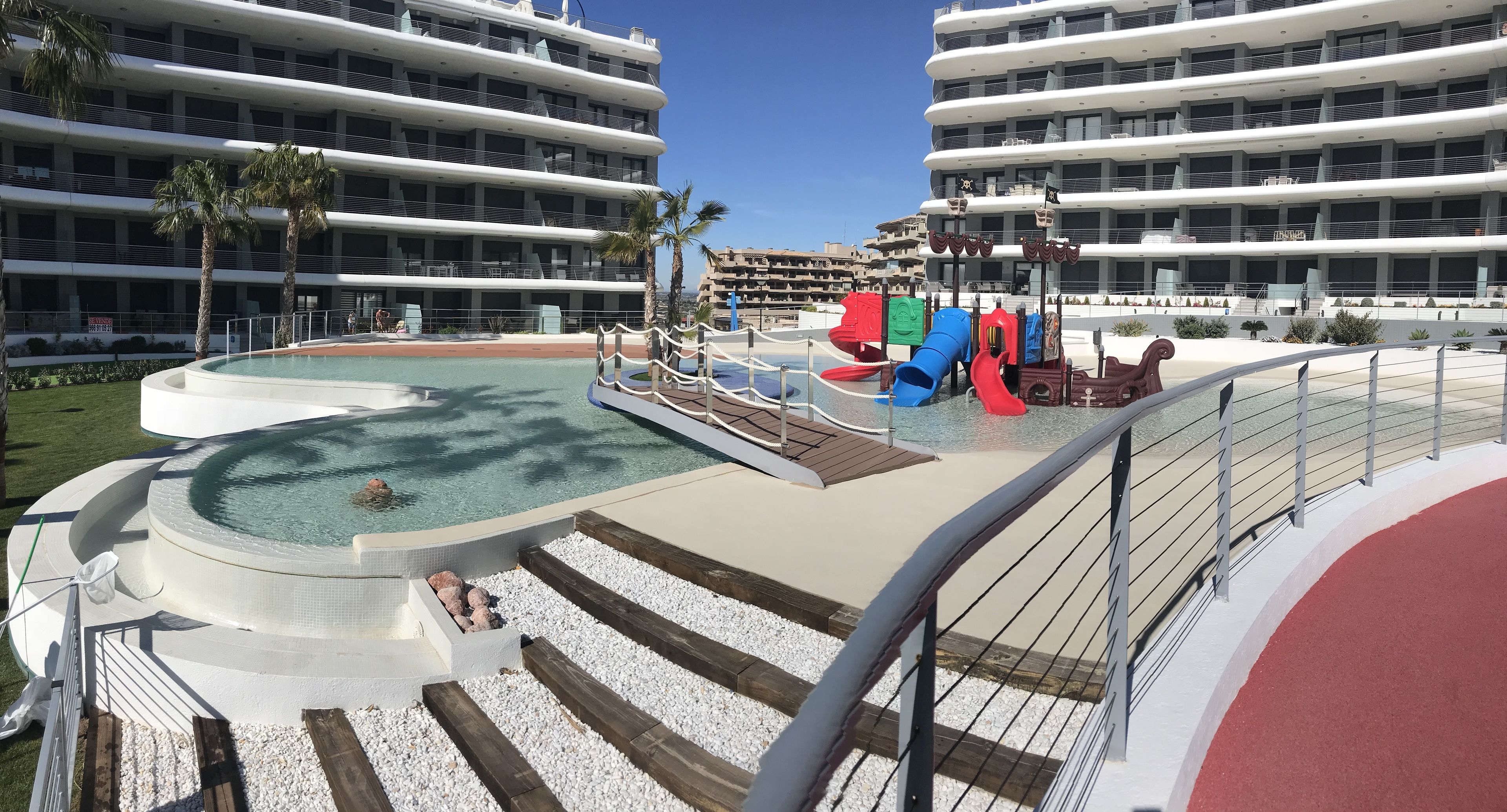 outdoor pool, pool umbrellas, pool loungers