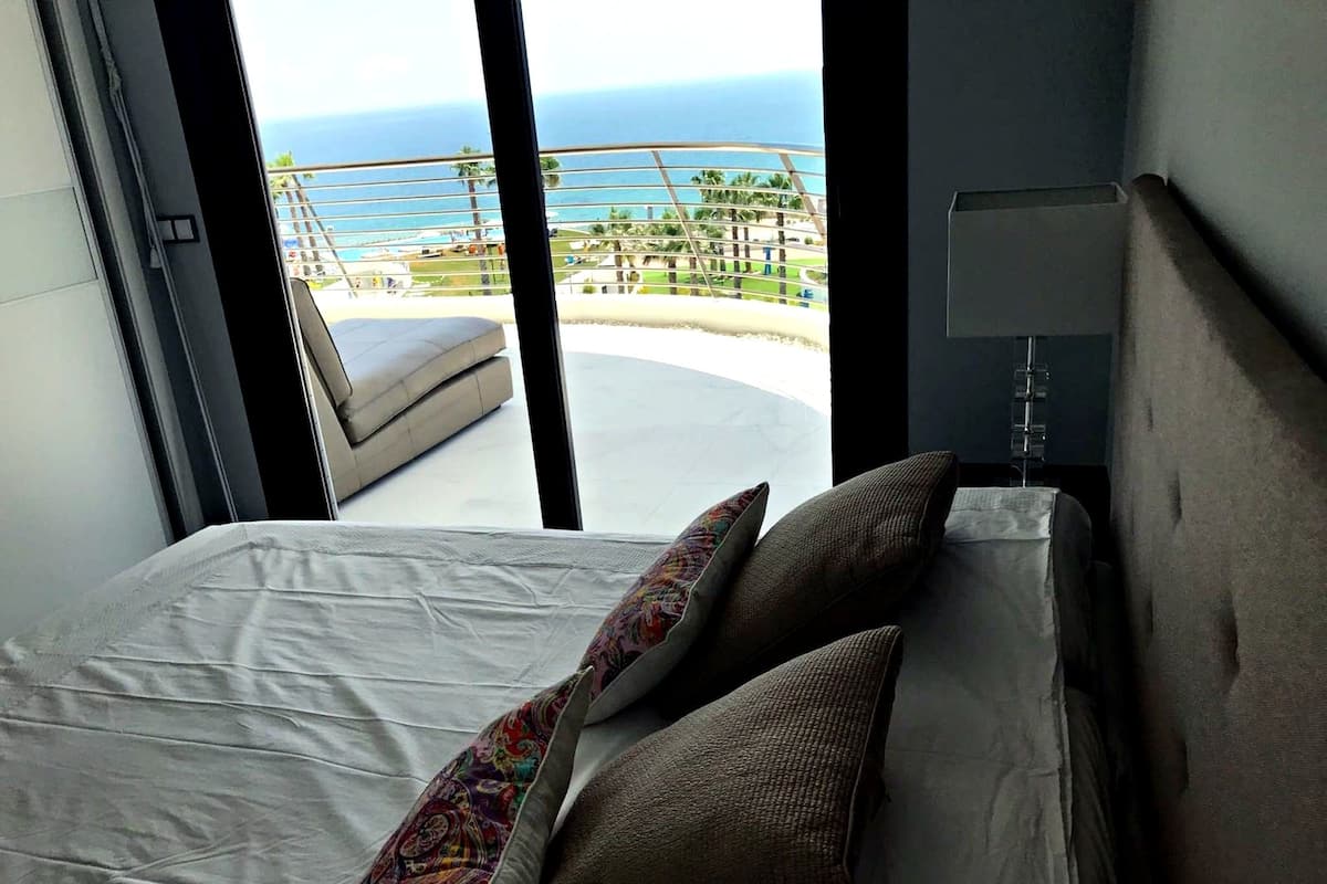 Apartment, Ocean View | 3 bedrooms, in-room safe, desk, blackout drapes