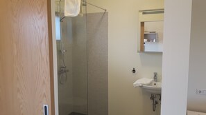 Apartment, 1 Bedroom | Bathroom | Shower, hair dryer, towels - Hjartarstadir Guesthouse (Eidar)