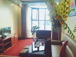 Quarto (VIP 1) | Sala de estar | TV de tela plana