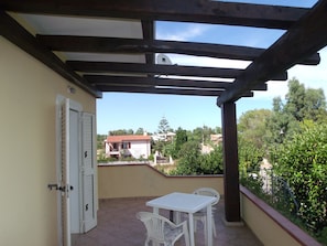 Appartement Romantique, 1 chambre, coin cuisine, en front de plage | Terrasse/Patio