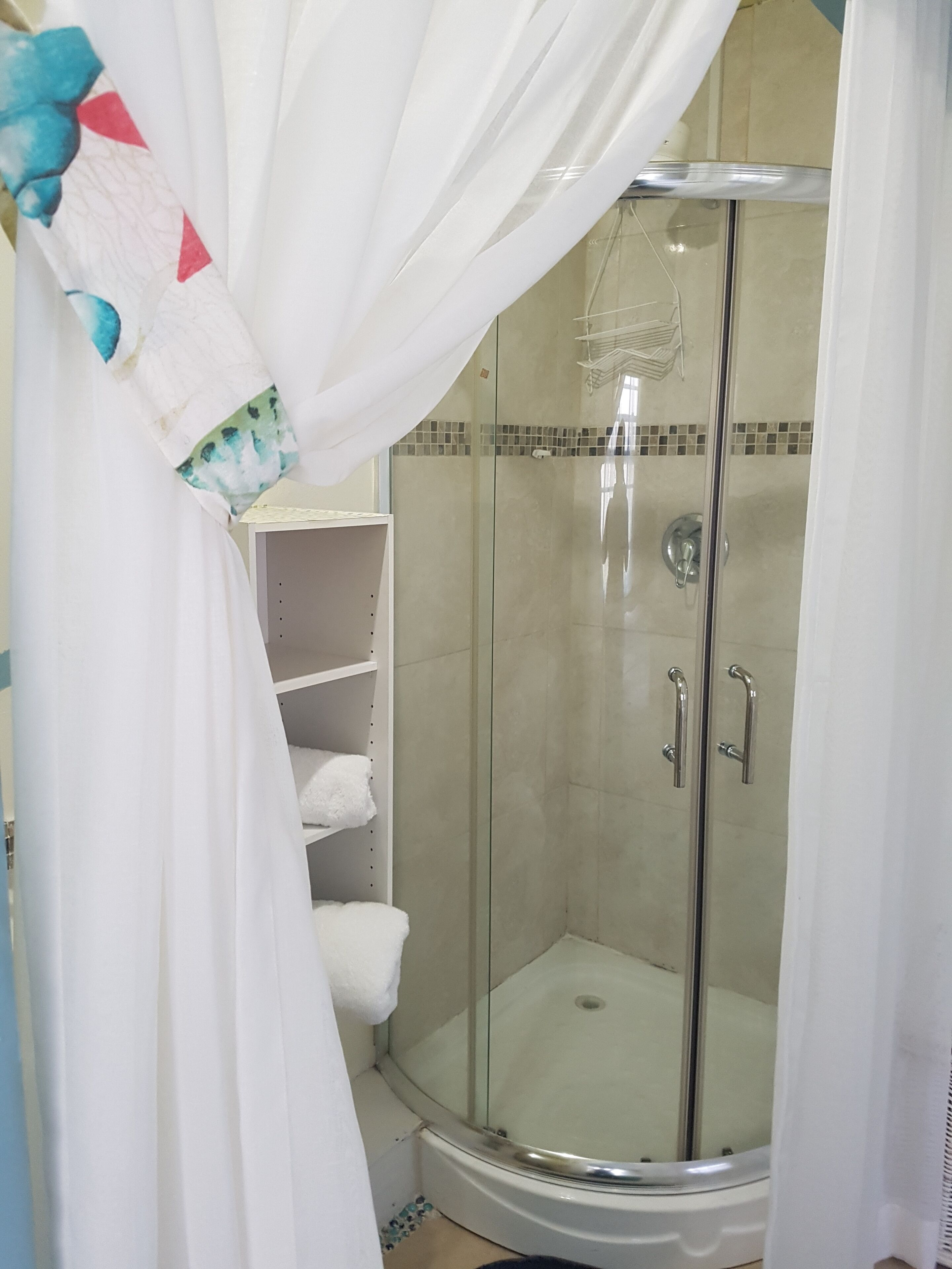 Basic Apartment, 1 Queen Bed, Garden View | Bathroom | Shower, free toiletries, hair dryer, towels