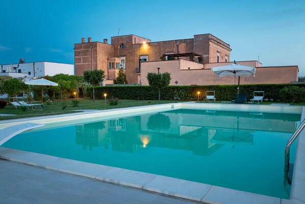 Seasonal outdoor pool, pool umbrellas, pool loungers