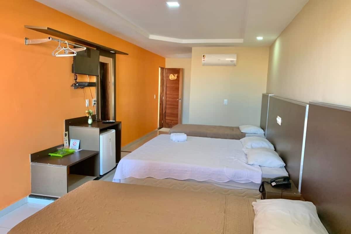 Deluxe Quadruple Room, Non Smoking | 1 bedroom, premium bedding, minibar, individually decorated