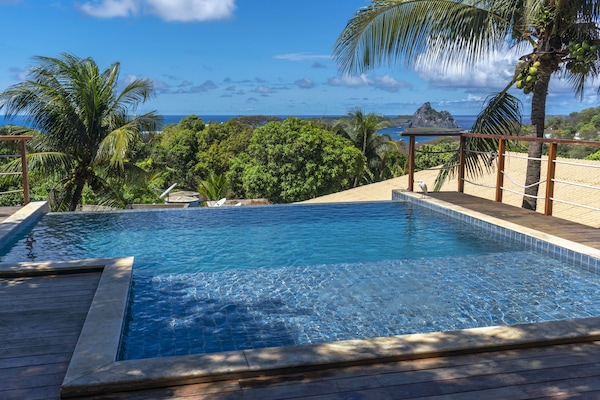 Outdoor pool, open 9:00 AM to 7:00 PM, sun loungers