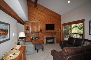 Deluxe Condo, 2 Bedrooms, Balcony, Mountain View | Living area | Fireplace