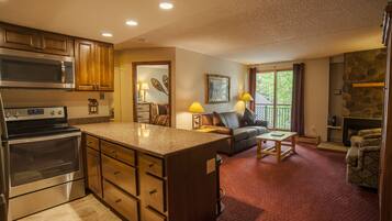 Premium Condo, Fireplace, Mountain View | Private kitchen | Fridge, microwave, oven, stovetop