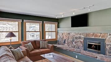 Classic Apartment, Multiple Beds, Pool Access | Living area | Fireplace
