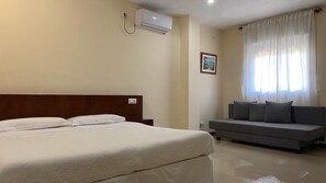 Familjerum | Värdeförvaringsskåp på rummet, mörkläggningsgardiner och ljudisolering