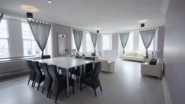 Apartment (Party Palace 2) | Living area | Flat-screen TV, iPod dock