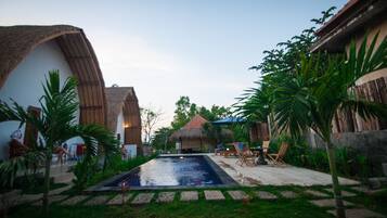 Outdoor pool, pool umbrellas, sun loungers