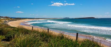 On the beach, beach towels
