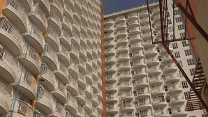A high-rise residential building with multiple balconies and a modern architectural design. - Oasis in Tagaytay (Tagaytay)