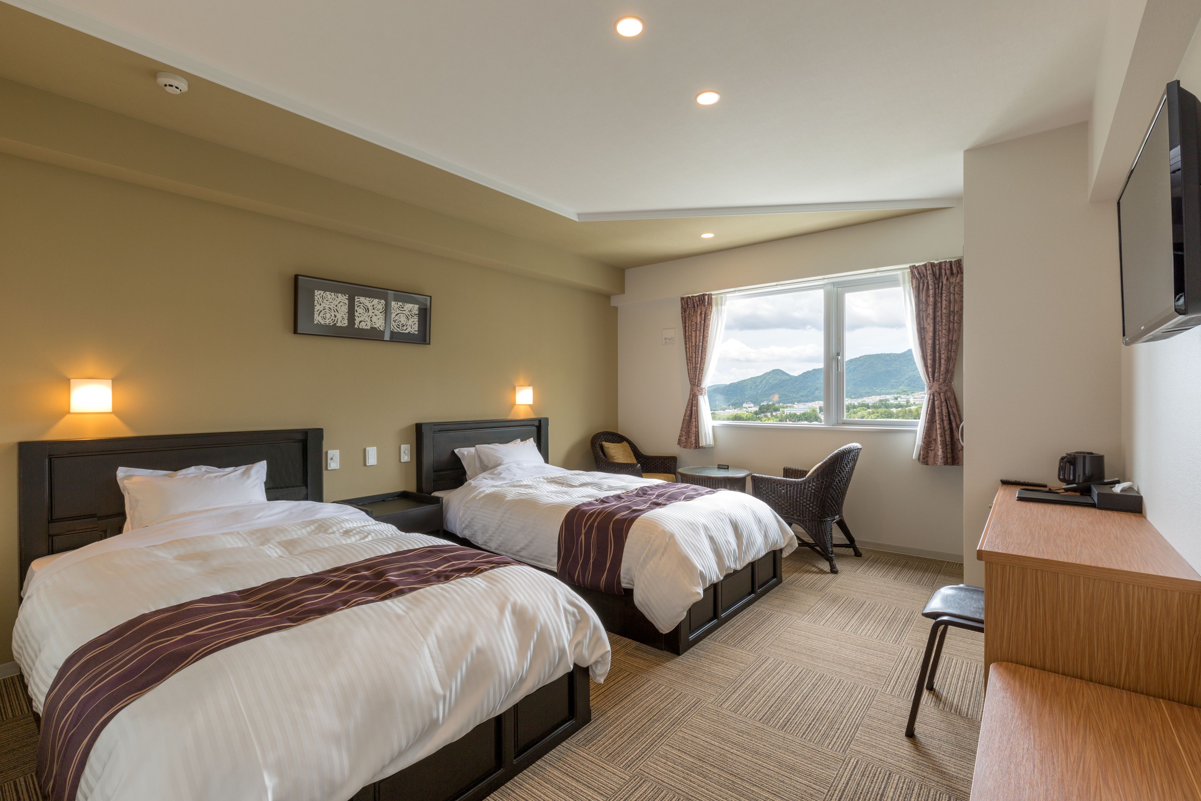 premium bedding, memory-foam beds, in-room safe, blackout curtains