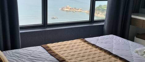 Apartamento família, 2 quartos | 2 quartos, frigobar, escrivaninha, ferros/tábuas de passar roupa