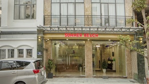 A multi-story building with a storefront labeled "SUMMER BEACH". - Summer Beach (Da Nang)