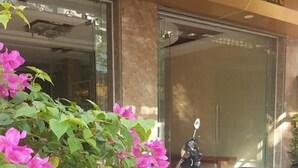 A storefront with a sign reading "SUMMER BEACH WELCOME". - Summer Beach (Da Nang)