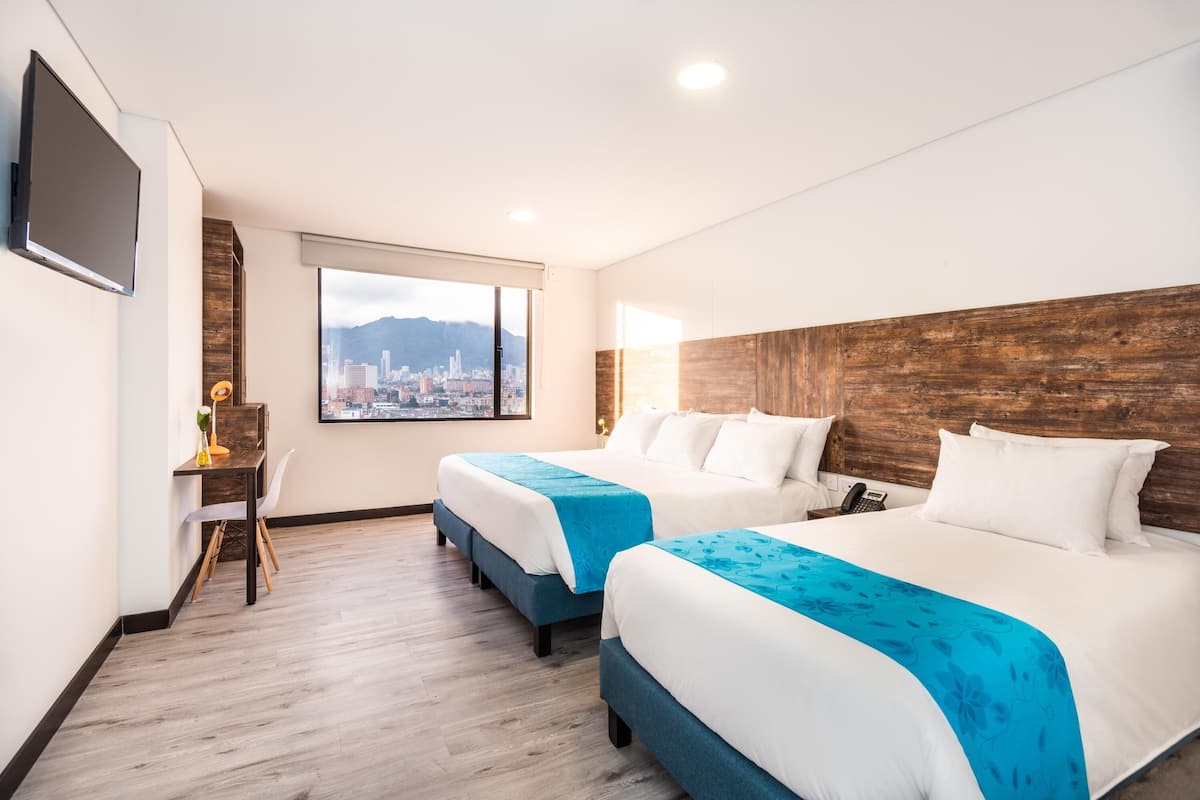 Twin Room | Minibar, in-room safe, desk, soundproofing
