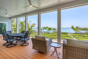 Outdoor dining - Grouper Getaway: Luxurious 4BR pool home with dock in Boca Grande. (Boca Grande)