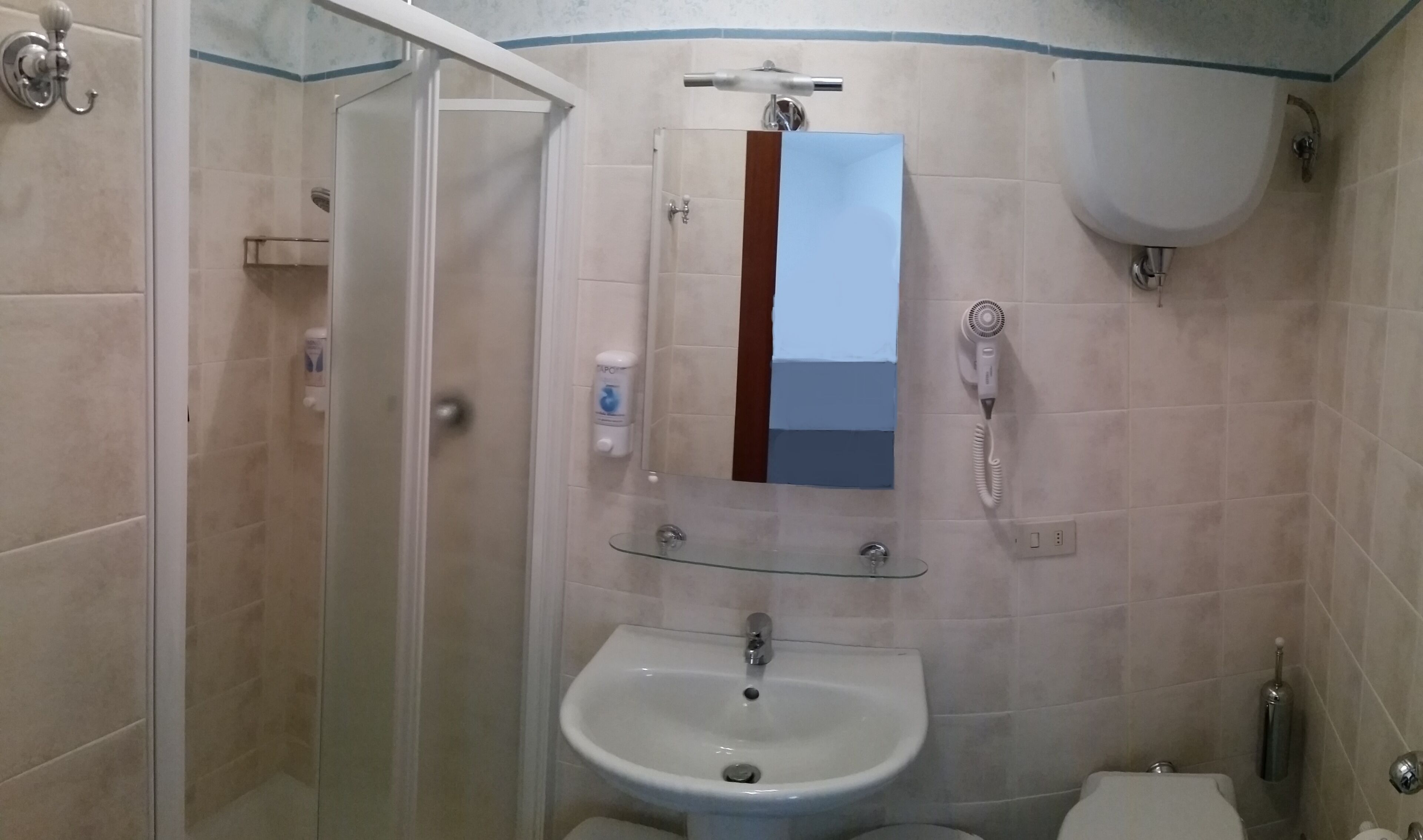 Shower, eco-friendly toiletries, hair dryer, slippers