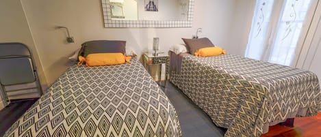 2 dormitorios, tabla de planchar con plancha, wifi gratis y ropa de cama
