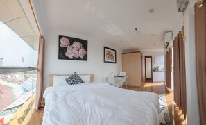 Studio Panoramique, coin cuisine, vue ville