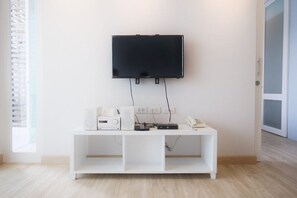 1-Bedroom Suite | Living area | 32-inch flat-screen TV with cable channels, TV - The Sea Condominium A22 (Sam Roi Yot)