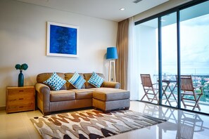 Apartment | Living room | Flat-screen TV - The Ocean Suites - A504 Tower A (Da Nang)