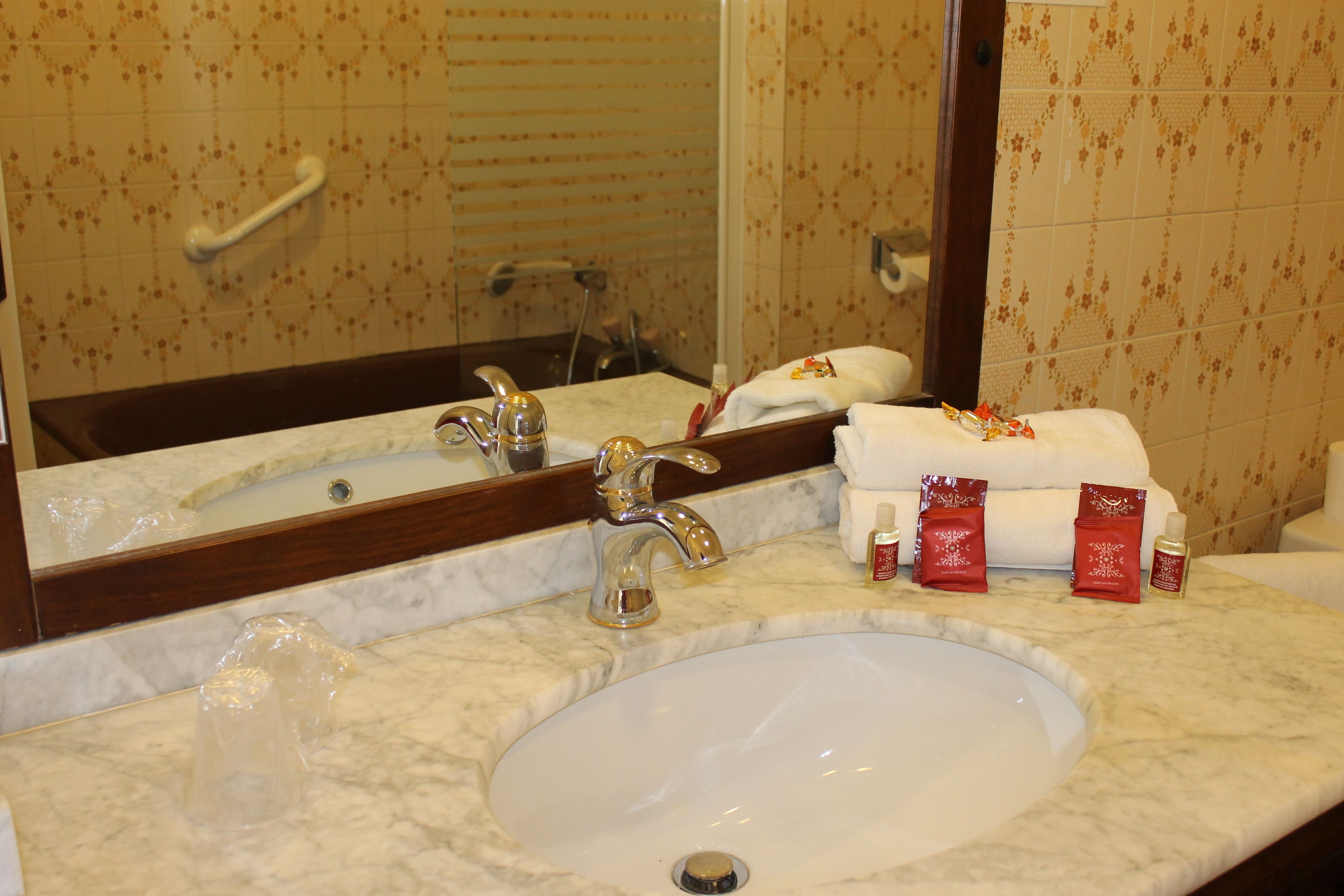 standard quadruple room | bathroom | free toiletries, hair dryer, towels