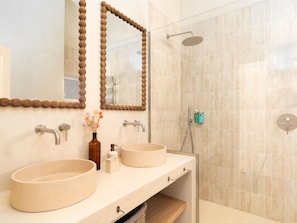 Bathtub, hair dryer, towels
