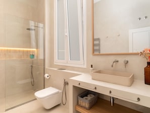 Bathtub, hair dryer, towels
